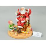 A BOXED ROYAL DOULTON FIGURE GROUP, 'Father Christmas' (figure of the year 2011) HN5436, with