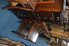 A PAIR OF STAG MINISTRAL FOUR DRAWER BEDSIDE CHESTS and an oak tea trolly (3)
