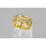 A LATE 20TH CENTURY BYZANTINE STYLE DIAMOND SET BAND RING, satin finish with applied bead work