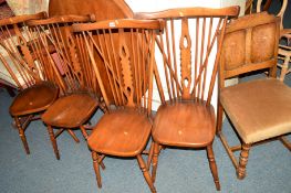 A SET OF FOUR SPINDLED HIGH BACK CHAIRS and a set of four oak chairs (8)