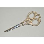 A PAIR OF SILVER HANDLED GRAPE SCISSORS, the handles decorated with embossed grapes and vines,