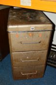 AN INDUSTRIAL THREE DRAWER FILE CABINET