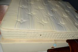 A 4' 6' DIVAN BED and mattress