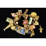 A MID 20TH CENTURY 9CT GOLD FANCY LINK CHARM BRACELET, together with twenty three (one loose)