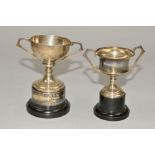 TWO SMALL SILVER TWIN HANDLED TROPHY CUPS, both with black plastic bases, Birmingham 1959 and