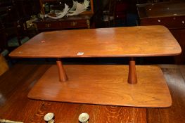 A 1960's/70's TEAK TWO TIER COFFEE TABLE with double cylindrical supports on coasters, approximate