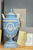 A BOXED LIMITED EDITION WEDGWOOD JASPERWARE COVERED TWIN HANDLED AND FOOTED URN, from 'The Royal