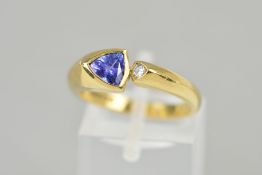 A 9CT GOLD TANZANITE AND DIAMOND RING, designed as a triangular tanzanite collet set to the terminal