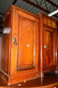 AN EDWARDIAN WALNUT POT CUPBOARD and a Victorian mahogany pot cupboard (2)