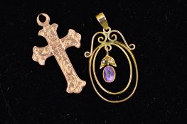 TWO EDWARDIAN 9CT GOLD PENDANTS, the first designed as a cross with engraved foliate decoration, the