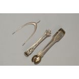 THREE PAIRS OF SILVER SUGAR TONGS, the first of spring release wishbone design, hallmarked