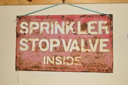 A 20TH CENTURY PAINTED CAST IRON WALL SIGN, reading Sprinkler Stop Valve inside