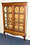 AN EDWARDIAN MAHOGANY AND INLAID ASTRAGAL GLAZED TWO DOOR DISPLAY CABINET above two drawers on