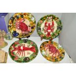 FOUR MAJOLICA PALISSY STYLE LOBSTER AND CRAB PLAQUES, with central crab or lobster surrounded by