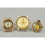 THREE WATCH HEADS to include two 9ct gold early 20th Century watch heads, both stamped R W C Ltd (