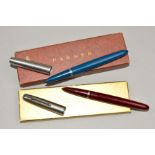 A BOXED PARKER 51 FOUNTAIN PEN in burgundy with a Lustraloy cap and another '51' in teal and