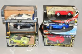 SIX BOXED DIE-CAST CARS, to include Jadi, Hot Wheels, Maisto