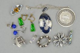 NINE ITEMS OF SILVER AND WHITE METAL JEWELLERY to include an orange paste Charles Horner brooch, a