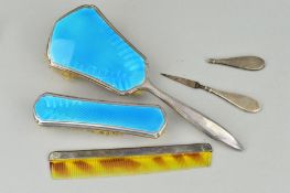 A 1930'S SILVER ENAMEL DRESSING TABLE SET to include two brushes with blue guilloche enamel panels