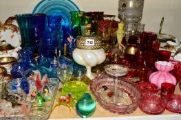 A LARGE QUANTITY OF COLOURED GLASS to include cranberry and blue table lustres and lamp work