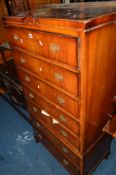 A TALL REPRODUCTION WALNUT CHEST of seven various drawers on cabriole feet, approximate width 77cm x
