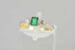 AN EMERALD AND DIAMOND RING, the central rectangular emerald flanked by brilliant cut diamonds,