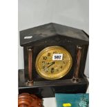 A SMALL SLATE MANTEL CLOCK, no key or pendulum, approximate height 23cm