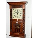 AN OLD CHARM OAK WALL CLOCK