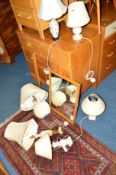 AN OAK DRESSING CHEST with triple mirrors, a coucasion style rug, six various table lamps, modern