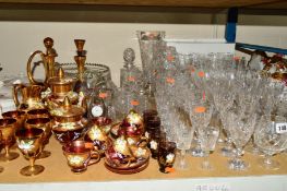 A QUANTITY OF CUT GLASS AND A GILDED CONTINENTAL RED GLASS TEA SET to include drinking glasses,