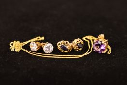 FIVE ITEMS OF JEWELLERY to include an amethyst pendant and a fine curb link chain, clasp stamped