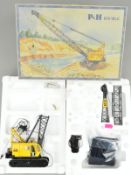 A BOXED NZG P & H 670 WLC CRAWLER CRANE/DRAG LINE, No.525, 1/50 scale, appears largely complete,