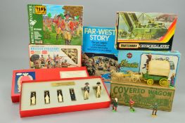 A BOXED MODERN PRODUCTS COVERED WAGON, version with four horses, playworn condition, missing