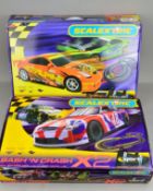 TWO BOXED SCALEXTRIC SETS, Bash 'N Crash, No.C1135 and Powerslide, No.C1166, both appear complete