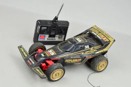 A NIKKO PLASTIC BATTERY OPERATED RADIO CONTROL BUGGY, not tested, appears complete and in fair