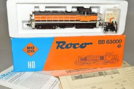 A BOXED ROCO HO GAUGE SNCF CLASS BB63000 LOCOMOTIVE, No.BB.63837, S.N.C.F orange and brown livery (