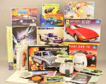 A QUANTITY OF UNBUILT PLASTIC MAINLY CAR MODEL KITS, assorted scales and makers, Airfix, Revell,