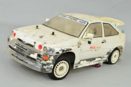 A FORD ESCORT RS COSWORTH RADIO CONTROL RALLY CAR, no remote control, so not tested, some paint loss