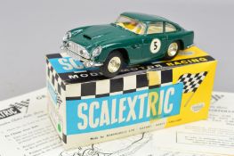 A BOXED SCALEXTRIC ASTON-MARTIN D.B. GT CAR WITH LIGHTS, No.E/3, British racing green body with