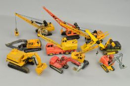 A QUANTITY OF UNBOXED AND ASSORTED DIECAST CRANE AND EXCAVATOR MODELS, Dinky, Corgi, NZG, Conrad,