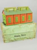 A BOXED HORNBY SERIES O GAUGE NO.E2E ENGINE SHED, appears complete and in very good condition for