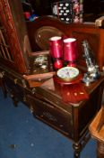 AN EARLY 20TH CENTURY OAK PANELLED MIRROR BACK SIDEBOARD with two drawers, approximate width 138cm x