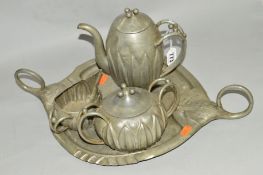 AN A E CHANAL ART NOUVEAU THREE PIECE PEWTER TEA/COFFEE SET ON A TRAY, all pieces stamped Chanal,