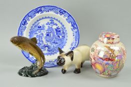A WINSTANLEY CAT STALKING, length 24cm, together with a Beswick Trout No 1032 (fin broken), a
