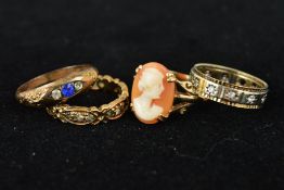 A SELECTION OF DRESS RINGS to include two synthetic spinel full eternity rings, a cameo ring and