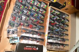 A QUANTITY OF BOXED MODERN DIECAST FORMULA ONE RACING CAR MODELS, majority appear to be from the
