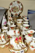 ROYAL ALBERT 'OLD COUNTRY ROSES' TEA SET/DINNERWARE, to include seven tea cups, condiment set, a