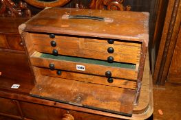 A 20TH CENTURY OAK ENGINEERS CHEST, containing precision tools, (key) (situated by lot 1279)