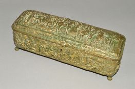 A CONTINENTAL BRASS TRINKET BOX OF RECTANGULAR FORM, cast in relief with tavern scenes and