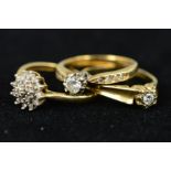 THREE 9CT GOLD DIAMOND RINGS, the first designed as brilliant cut diamond to the single cut